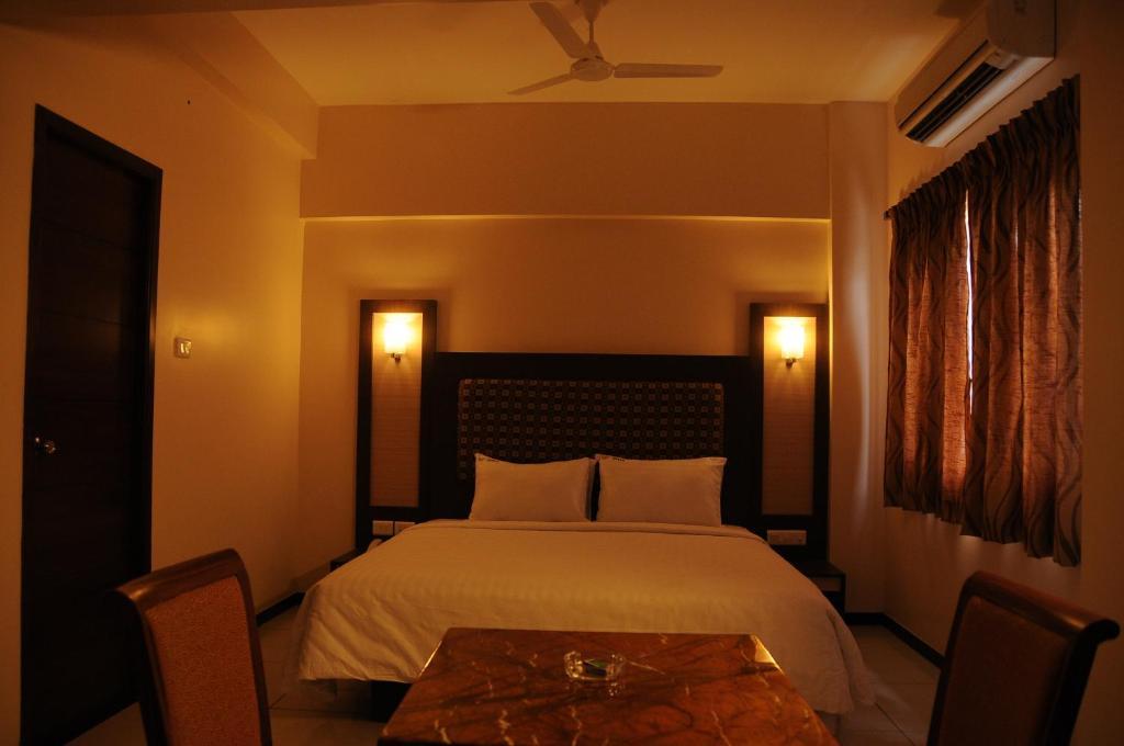 Hotel Viswas Tiruppur Rum bild