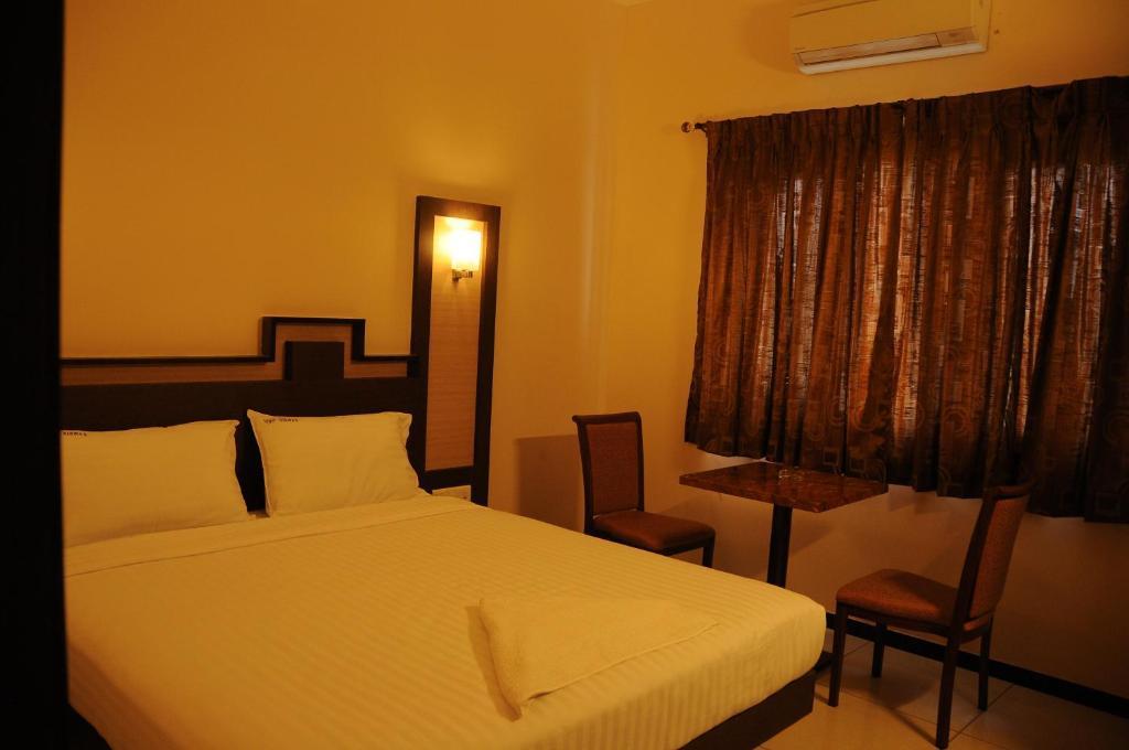 Hotel Viswas Tiruppur Rum bild